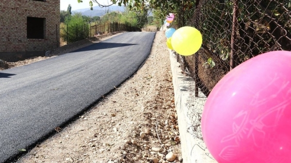 MP attends opening of a new road in Bazar-Korgon district